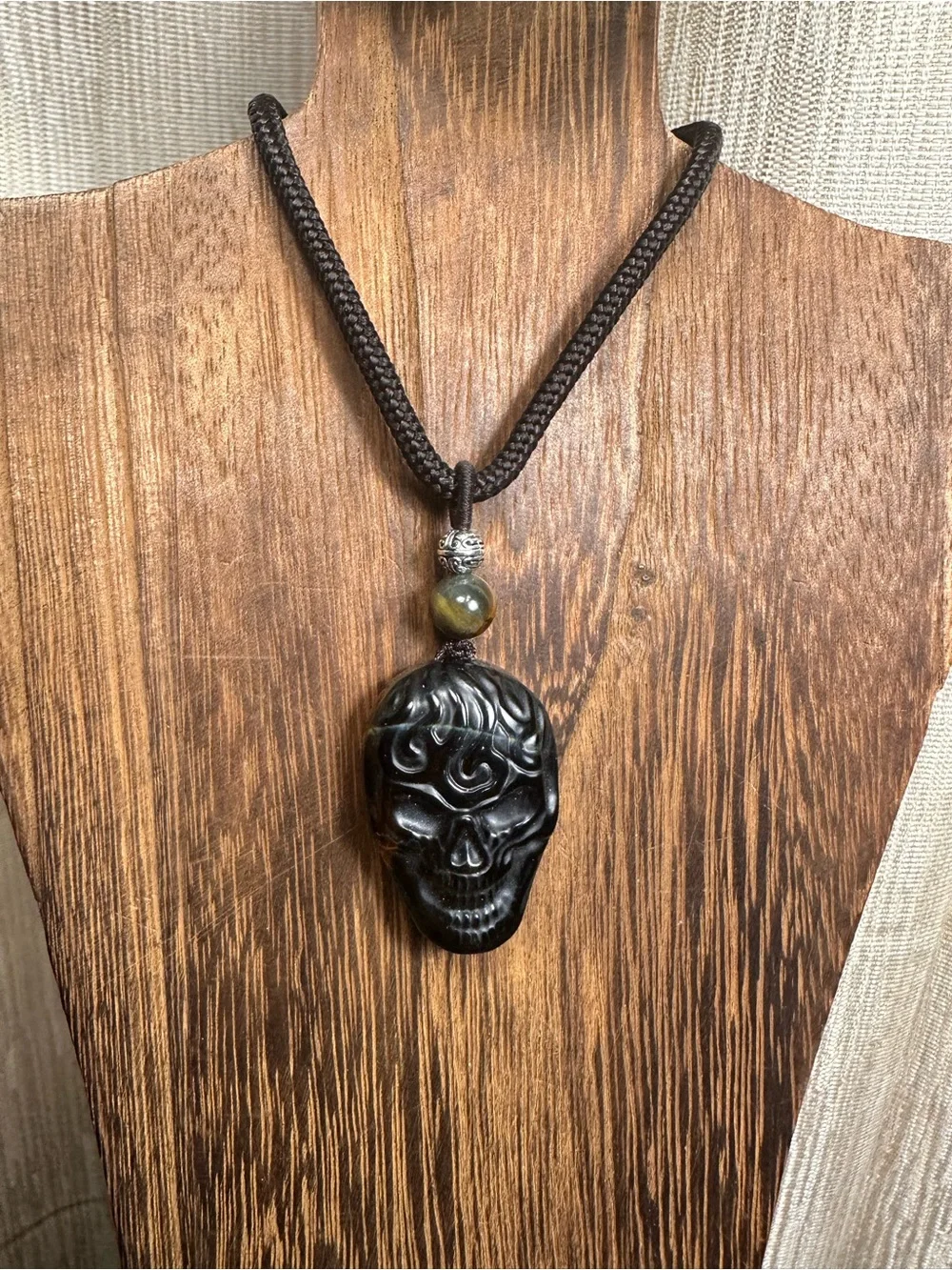 Unique Blue and Golden Tiger’s Eye Skull Carving Pendant Necklace on Brown
